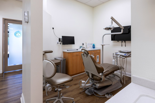 Dental chair in exam room at Higher Ground Dentistry in Upland, CA