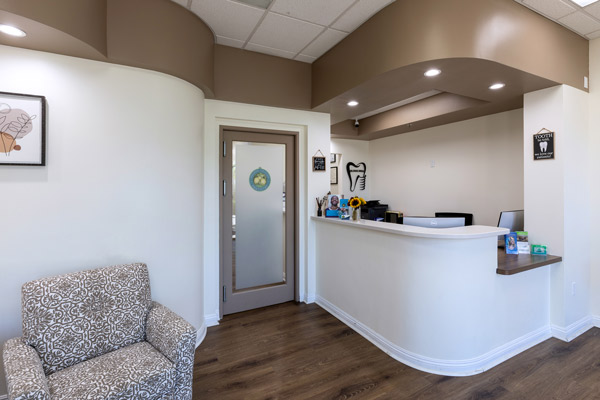 Front desk and doorway at Higher Ground Dentistry in Upland, CA