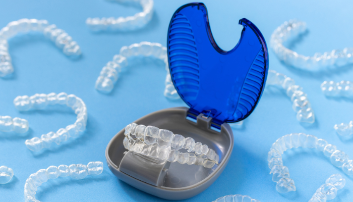 Based on your uploaded image of clear Invisalign aligners in a blue storage case, here are the SEO-optimized elements:
1. SEO-Optimized Alt Text (125 characters max)
Clear Invisalign aligners stored in blue protective case showing proper Invisalign care storage methods