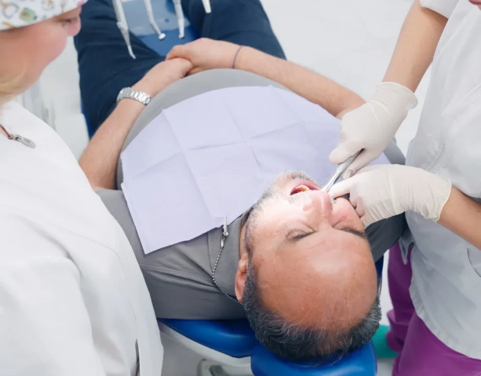 Dr. Sikka explaining wisdom tooth extraction to a patient at Higher Ground Dentistry in Upland CA