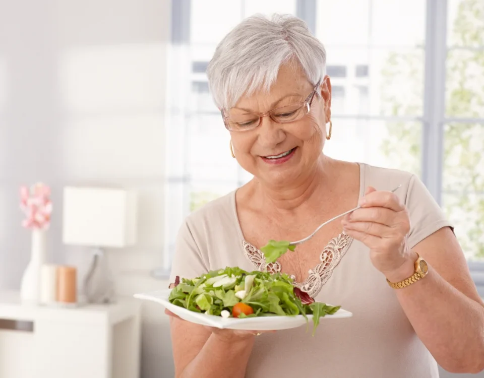 Patient practicing good dental implant care habits at home