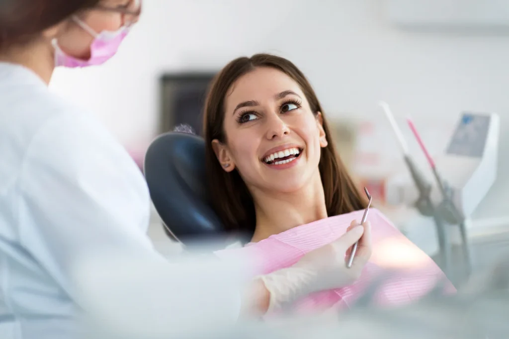 Smiling patient during dental consultation for wisdom teeth extraction at Higher Ground Dentistry in Upland CA
