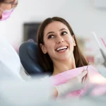 Smiling patient during dental consultation for wisdom teeth extraction at Higher Ground Dentistry in Upland CA
