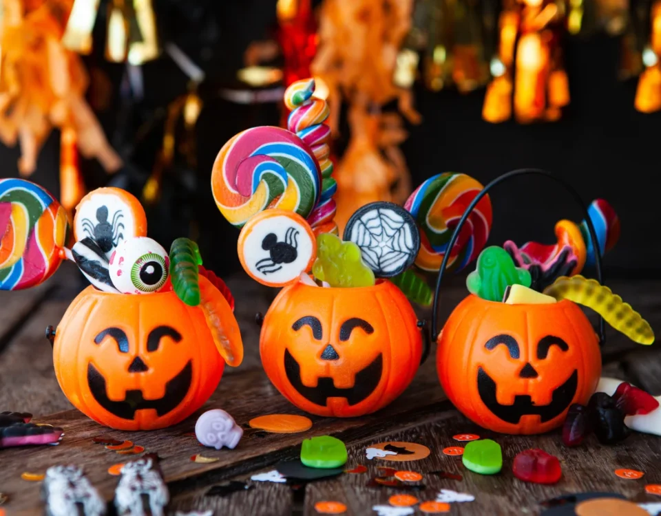 Halloween pumpkin buckets filled with candy — tips to protect teeth from candy at Higher Ground Dentistry Upland CA