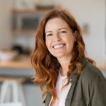 Woman with a natural confident smile representing World Smile Day and smile makeover services at Higher Ground Dentistry Upland CA